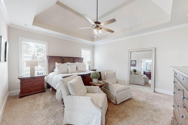 617 Morris Run, North Augusta, SC 29860 - bedroom featuring a tray ceiling, light carpet, baseboards, ornamental molding, and a ceiling fan