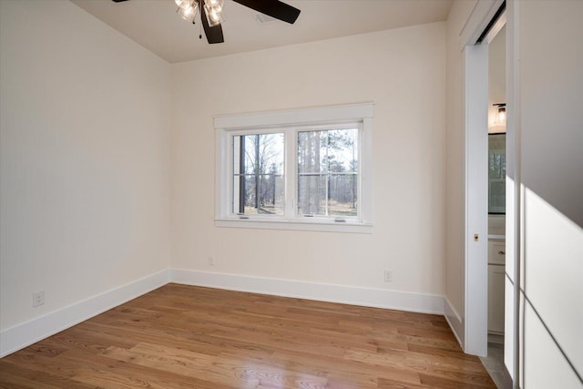 spare room with ceiling fan and light hardwood / wood-style flooring