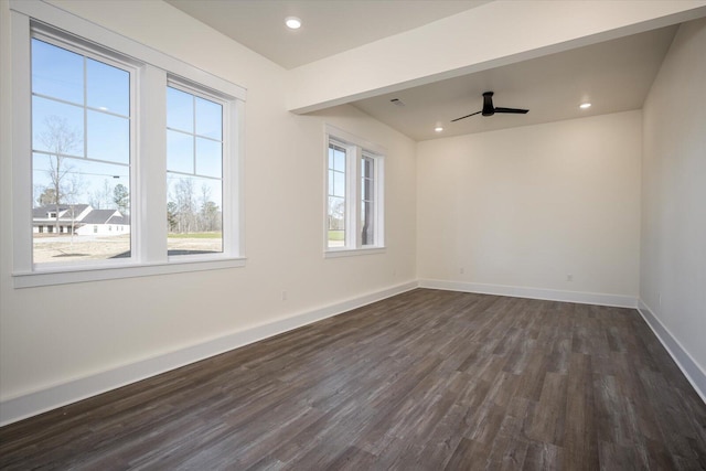 unfurnished room featuring dark hardwood / wood-style floors and ceiling fan