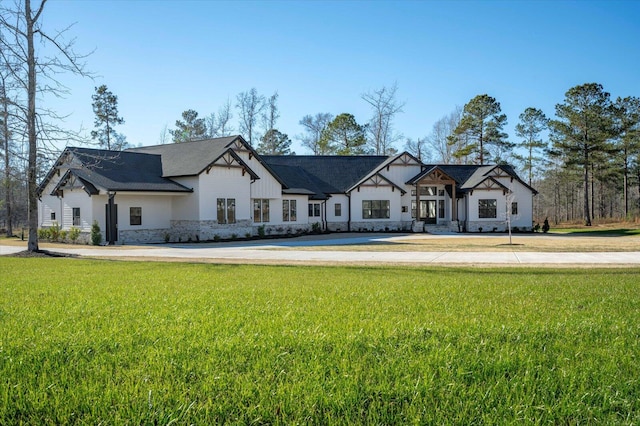 modern farmhouse with a front yard