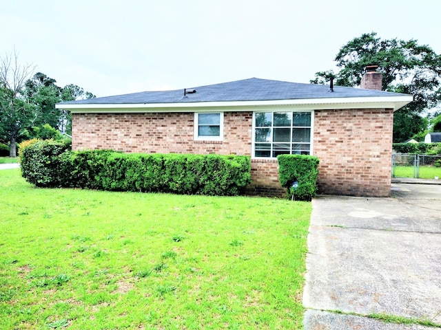 3959 Braddock St, Martinez, GA 30907 - ranch-style home with a chimney and brick siding