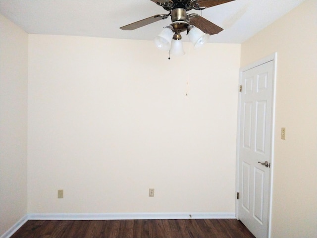 unfurnished room featuring ceiling fan, dark wood-style flooring, and baseboards