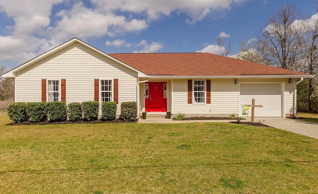 ranch-style house featuring a garage, concrete driveway, and a front yard