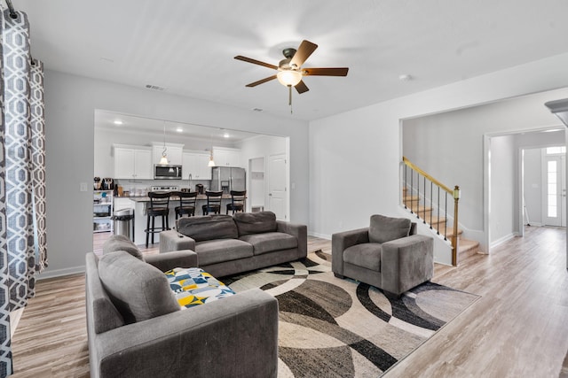 120 Dublin Loop, Grovetown, GA 30813 - living area featuring a ceiling fan, stairs, light wood-style floors, and recessed lighting
