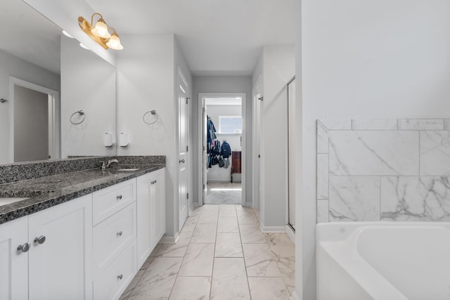 120 Dublin Loop, Grovetown, GA 30813 - full bath with marble finish flooring, double vanity, a garden tub, a walk in closet, and a stall shower