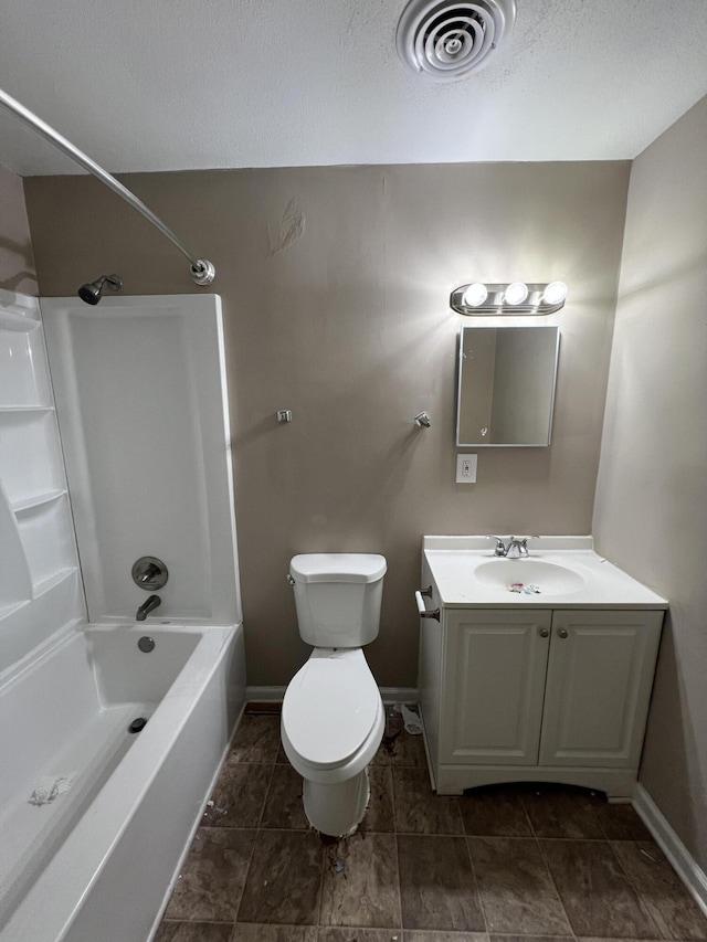 full bathroom with vanity, tub / shower combination, and toilet