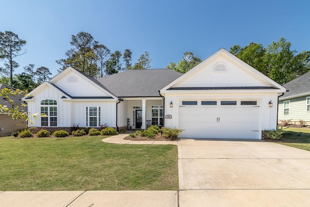 306 Bonhill St, North Augusta, SC 29860 - view of front of home with concrete driveway, board and batten siding, roof with shingles, a front yard, and a garage