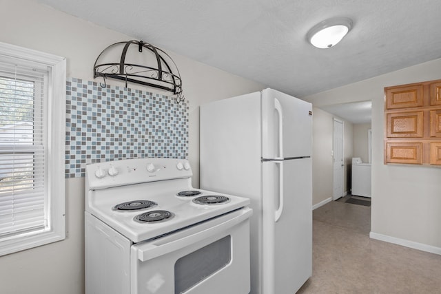 kitchen with washer / clothes dryer, backsplash, white appliances, and a textured ceiling