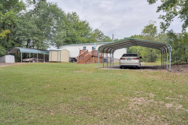 view of yard featuring a carport and a storage shed