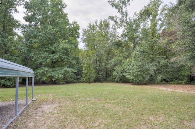 view of yard featuring a carport