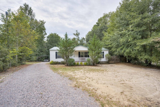 ranch-style house featuring a porch