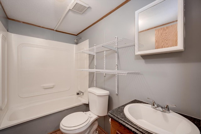 full bathroom with washtub / shower combination, crown molding, vanity, and toilet