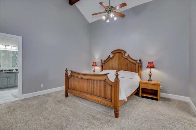 4512 Hardy Mcmanus Rd, Evans, GA 30809 - carpeted bedroom featuring ensuite bathroom, baseboards, ceiling fan, beam ceiling, and a sink