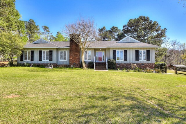 4512 Hardy Mcmanus Rd, Evans, GA 30809 - ranch-style house featuring a front yard, crawl space, roof with shingles, and a chimney