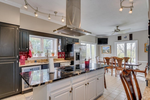 4512 Hardy Mcmanus Rd, Evans, GA 30809 - kitchen featuring dishwasher, black electric cooktop, stainless steel refrigerator with ice dispenser, island range hood, and ceiling fan
