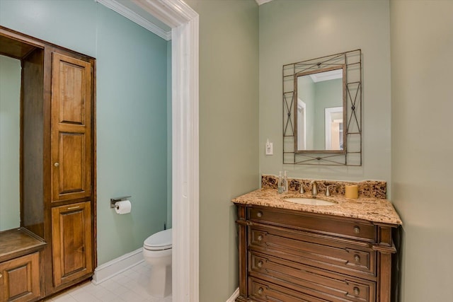 4512 Hardy Mcmanus Rd, Evans, GA 30809 - bathroom with baseboards, toilet, ornamental molding, and vanity
