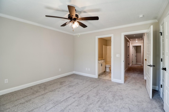 unfurnished bedroom featuring connected bathroom, ceiling fan, baseboards, ornamental molding, and light carpet