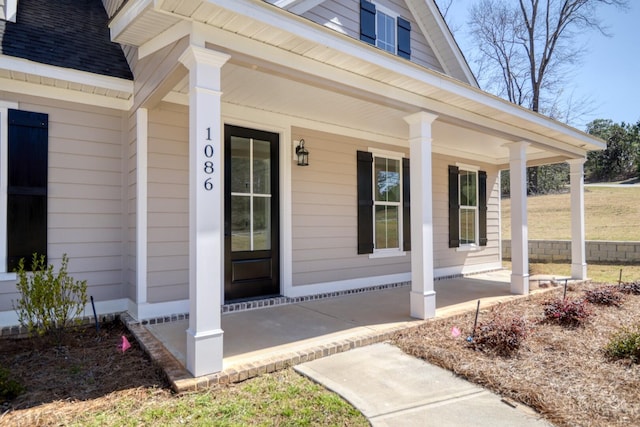 entrance to property with a porch