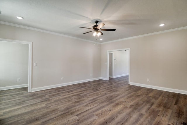 empty room with crown molding, baseboards, dark wood-type flooring, and ceiling fan