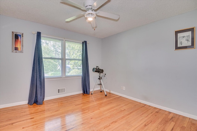 3114 Sussex Rd, Augusta, GA 30909 - unfurnished room with ceiling fan, light wood-style floors, and a textured ceiling