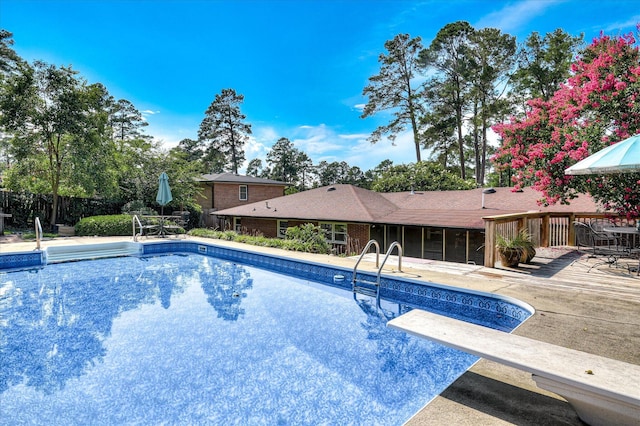 3114 Sussex Rd, Augusta, GA 30909 - swimming pool featuring a diving board and a patio