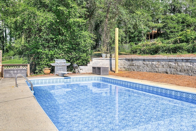 3114 Sussex Rd, Augusta, GA 30909 - outdoor pool with a diving board, grilling area, and a patio