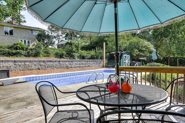 3114 Sussex Rd, Augusta, GA 30909 - view of pool with a shed, a fenced backyard, a deck, and outdoor dining space