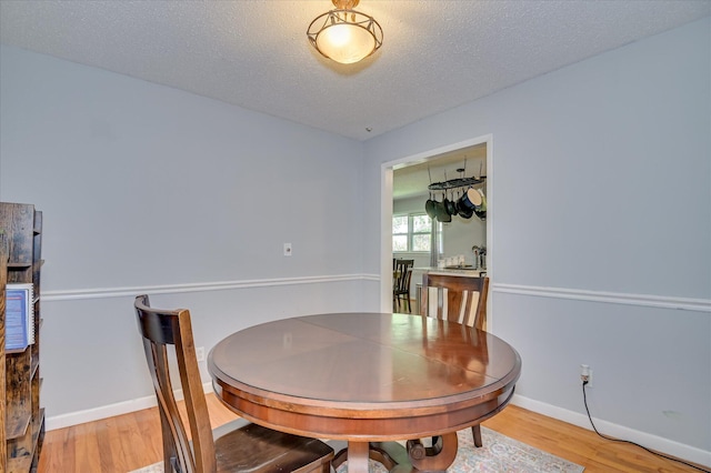 3114 Sussex Rd, Augusta, GA 30909 - dining room featuring light wood-style floors and a textured ceiling