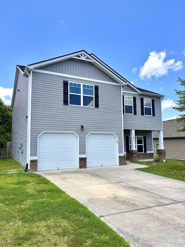 195 Sims Ct, Augusta, GA 30909 - view of front facade with an attached garage, a front yard, driveway, and brick siding