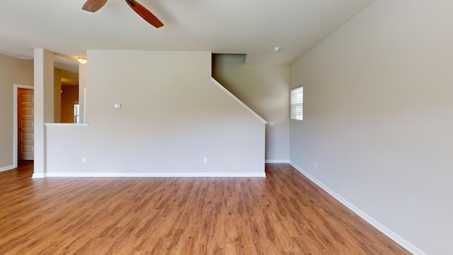 195 Sims Ct, Augusta, GA 30909 - unfurnished living room featuring light wood-type flooring, ceiling fan, and stairs
