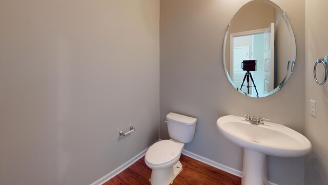 195 Sims Ct, Augusta, GA 30909 - bathroom featuring wood finished floors and toilet