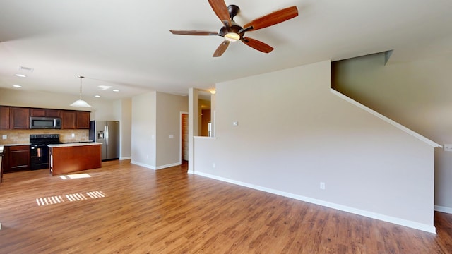195 Sims Ct, Augusta, GA 30909 - unfurnished living room with ceiling fan, light wood-style floors, and recessed lighting