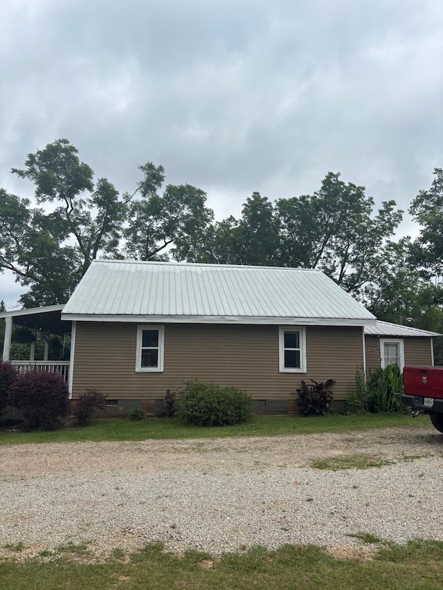 2023 Gamble School Rd, Stapleton, GA 30823 - view of side of home featuring metal roof