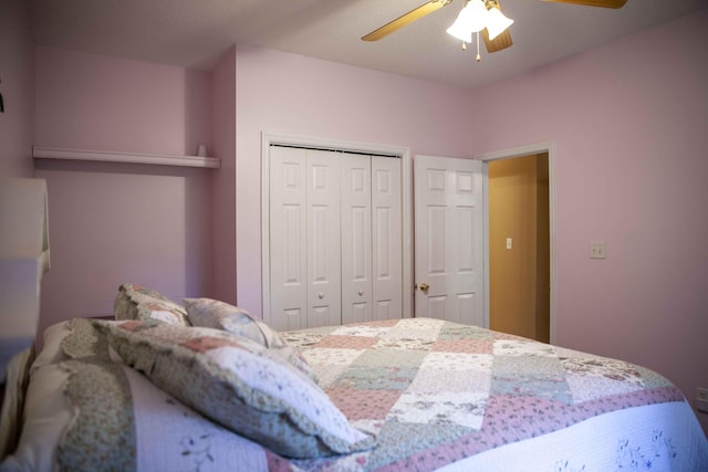 bedroom with ceiling fan and a closet