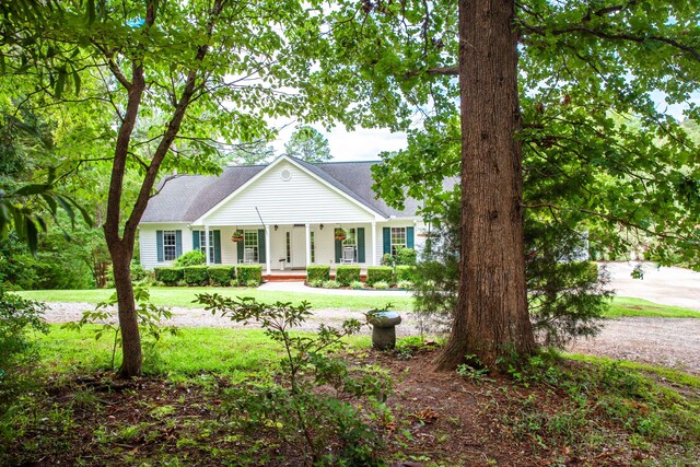 view of front of property featuring covered porch