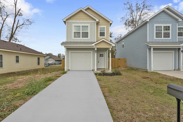 view of front facade featuring a garage and a front lawn