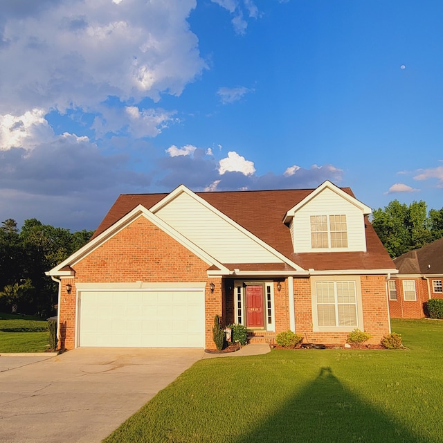 view of front of house featuring driveway, brick siding, a front yard, and an attached garage