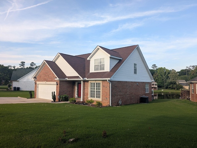 traditional home with brick siding, a front lawn, concrete driveway, and cooling unit