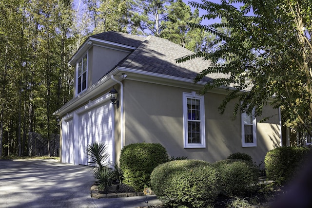 view of home's exterior with a garage