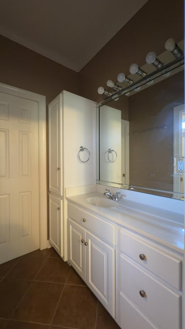 bathroom featuring tile patterned floors and vanity