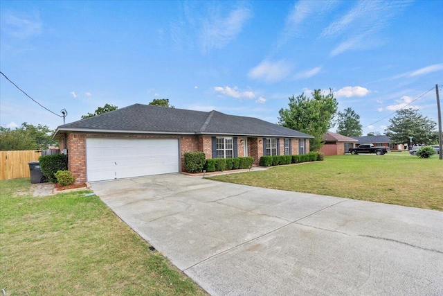 ranch-style home featuring driveway, a front yard, fence, brick siding, and a garage