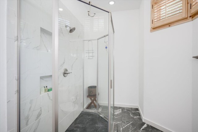 bathroom with an enclosed shower