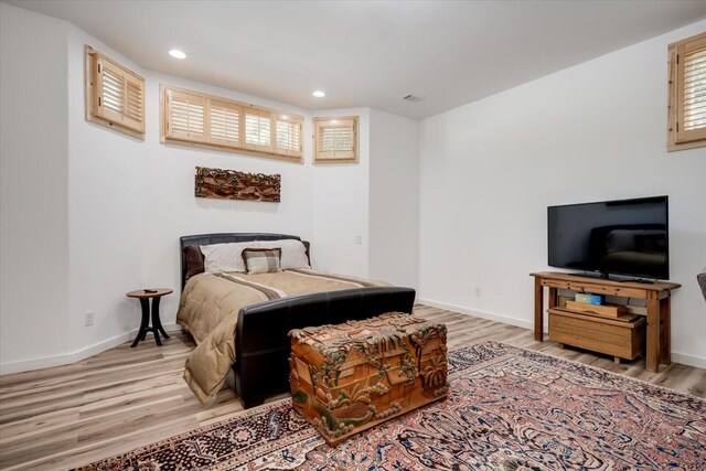 bedroom featuring wood-type flooring