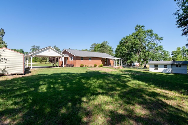 view of yard featuring a detached carport