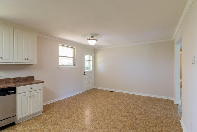 interior space featuring baseboards, ornamental molding, dark countertops, dishwasher, and white cabinets