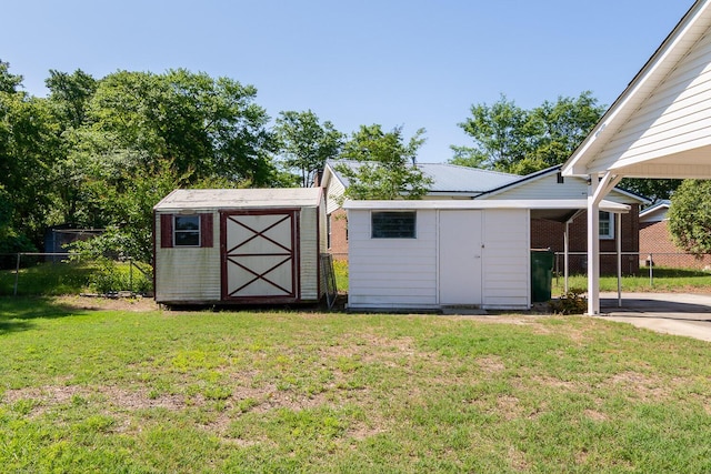view of shed with fence