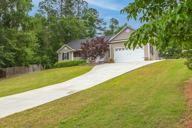 view of front facade featuring concrete driveway and a garage