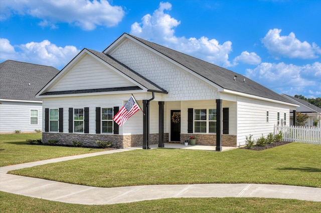 craftsman house with a front yard