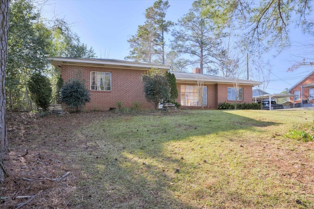 single story home featuring brick siding and a front yard