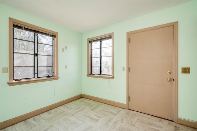 interior space with baseboards